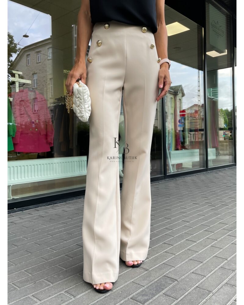 Textile trousers with gold buttons