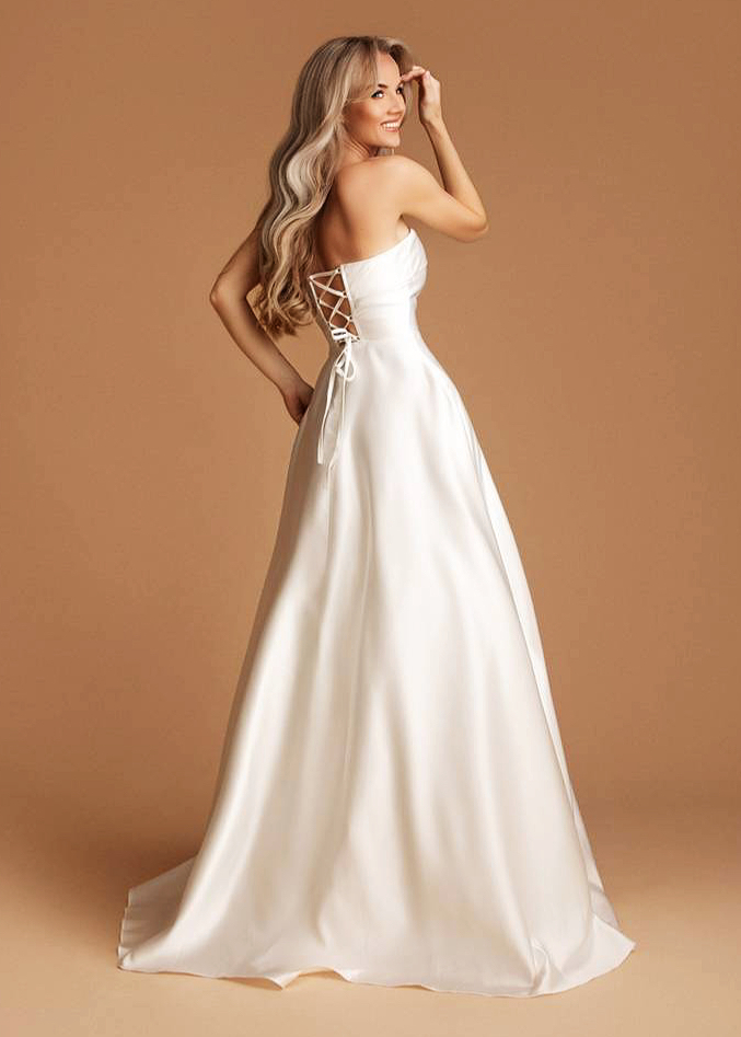 Korseti lõikega maksikleit ja taskutega