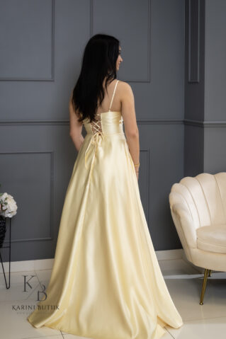 korsetiga maksikleit rohke seelikuosaga ja taskutega kooli lõpetamiseks.