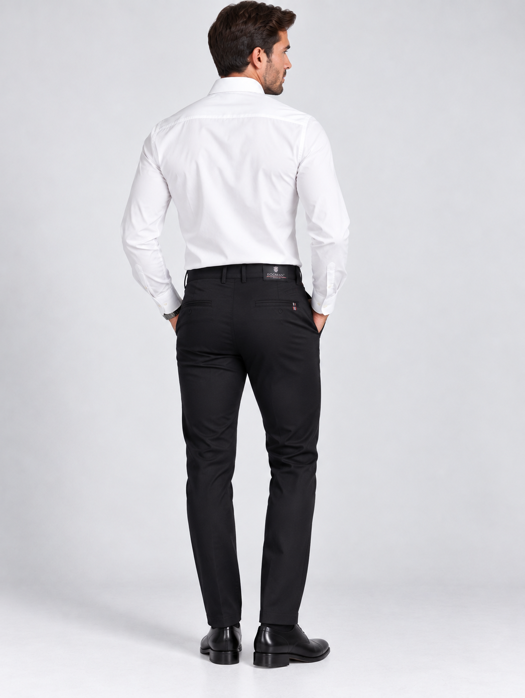 Mustjas navy sinised meeste Slim Fit püksid tagantvaates – Karini Butiik